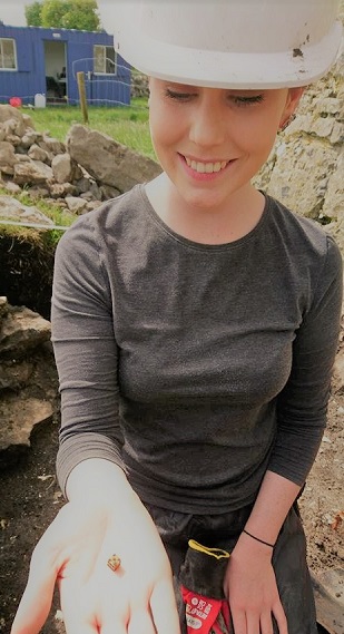 image of student working as archaeologist