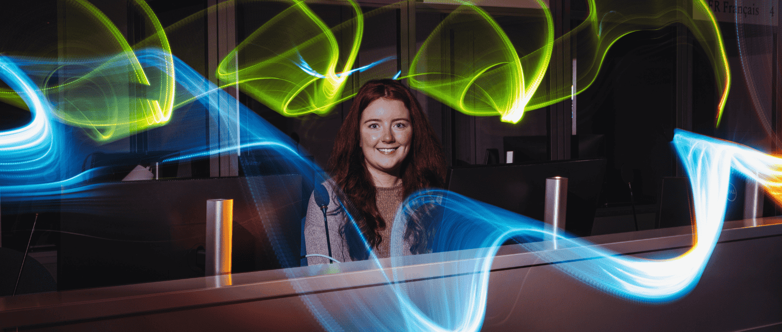 female student sitting in front of computer screen