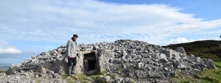 Professor Benbouzid at the entrance to a passage tomb at Carrowkeel, Co. Sligo.