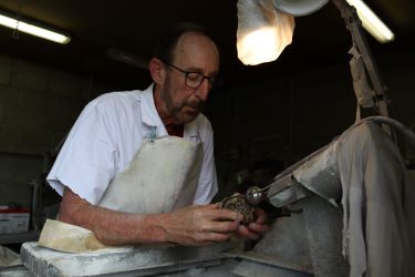 Fred Curtis - working flint with an abrasive wheel