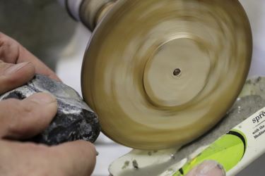 Wooden wheel - grinding a faced in flint