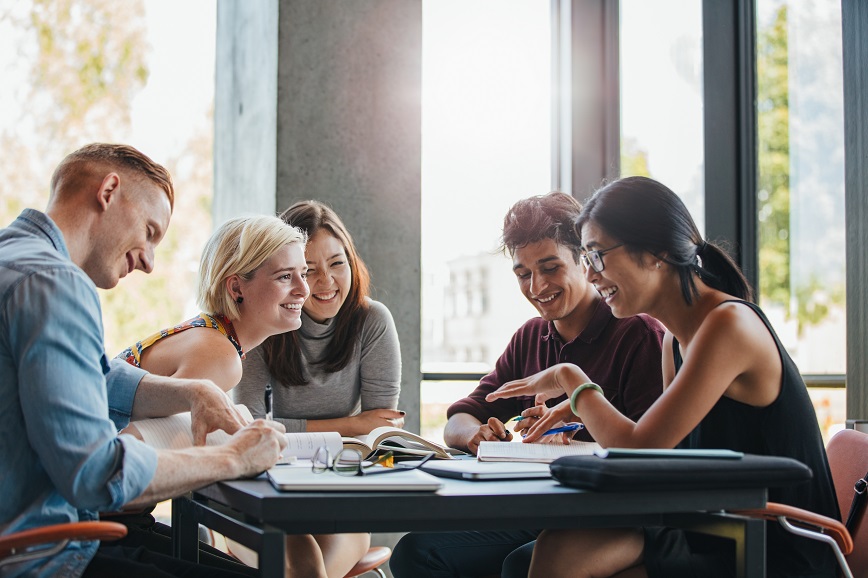 Group of students working and laughing