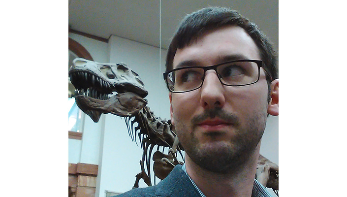 Dr Kevin Healy, School of Natural Sciences, University of Galway selfie in front of a T. rex at the