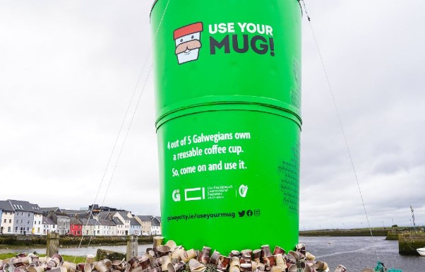 giant coffee mug reading "Use your mug" in Claddagh