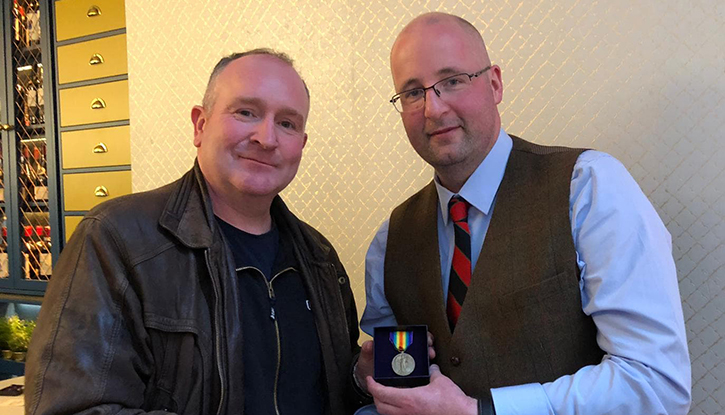 (l-r) Gerard &lsquo;Del&rsquo; Delaney presenting James Murray&rsquo;s WW1 Victory Medal to James&rsquo;s great grandson Dr 