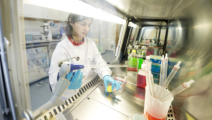 A scientist works in a CÚRAM lab at NUI Galway. Photo